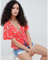 ASOS DESIGN Angel Sleeve Double Tie Top In Red Base Ditsy Floral Print