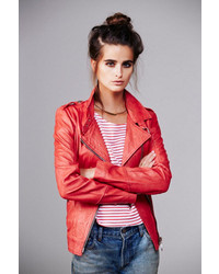 Doma Lady In Red Motorcycle Jacket
