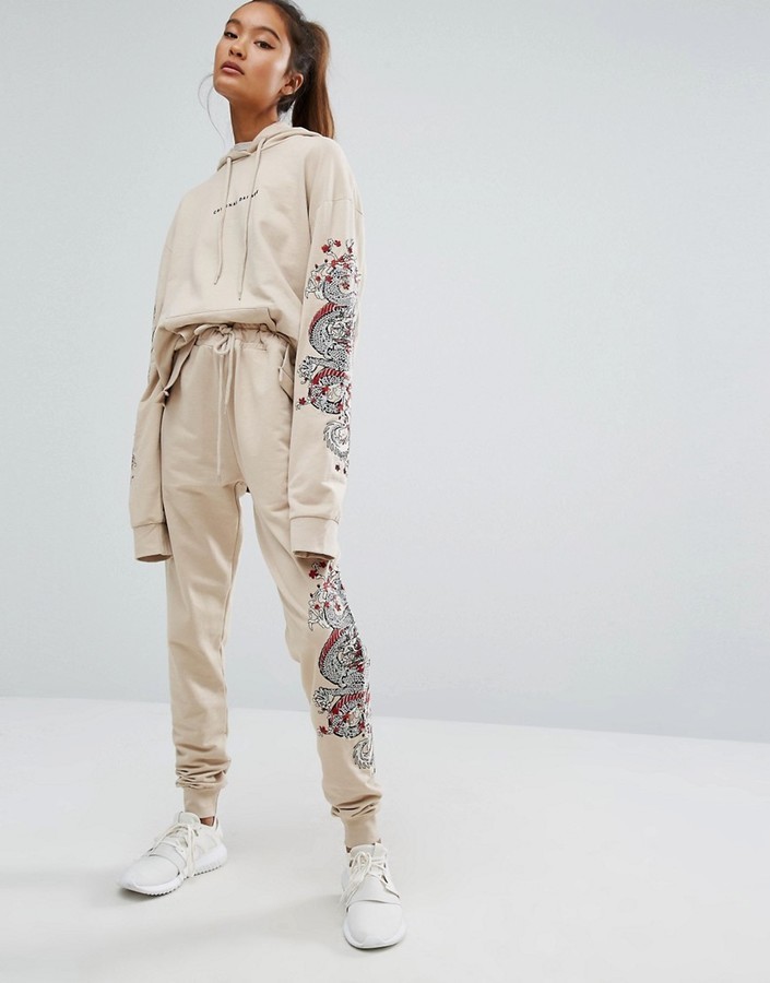 Criminal Damage Baggy Sweatpants With Leg Embroidery Co Ord, $91