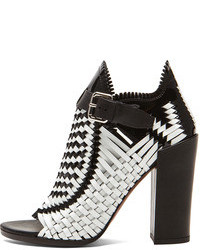 White and Black Cutout Leather Ankle Boots