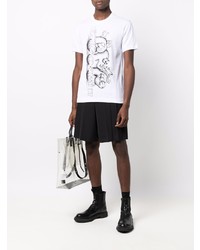 Comme Des Garcons SHIRT Comme Des Garons Shirt X Kaws Logo Print T Shirt