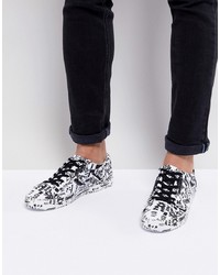 ASOS DESIGN Lace Up Trainers With Graffiti Print