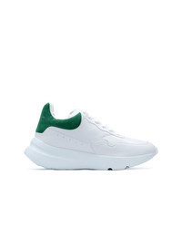 White and Green Athletic Shoes
