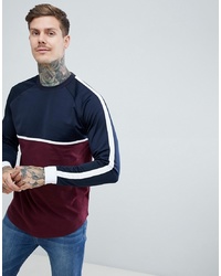 ASOS DESIGN Relaxed Longline Long Sleeve T Shirt With Contrast Yoke In Woven Fabric And Curved Hem In Navy