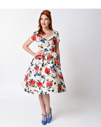 Unique Vintage 1950s Style Beige Floral Short Sleeve Draper Swing Dress