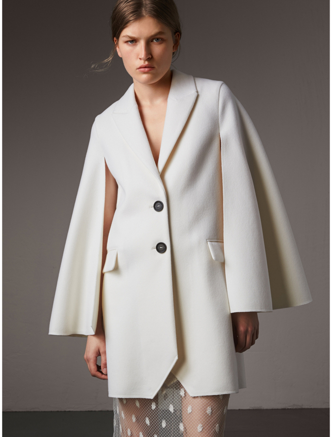 white cape coat