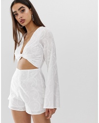 PrettyLittleThing Broderie Flare Sleeve Playsuit With Cut Out Detail In White