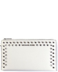 Women's White Clutches by MICHAEL Michael Kors | Lookastic