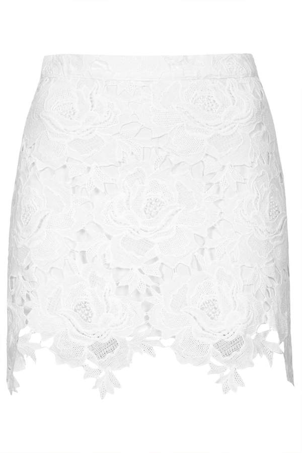 https://cdn.lookastic.com/white-lace-mini-skirt/tall-cut-out-rose-lace-skirt-with-metal-zip-at-the-back-100-cotton-machine-washable-original-55092.jpg