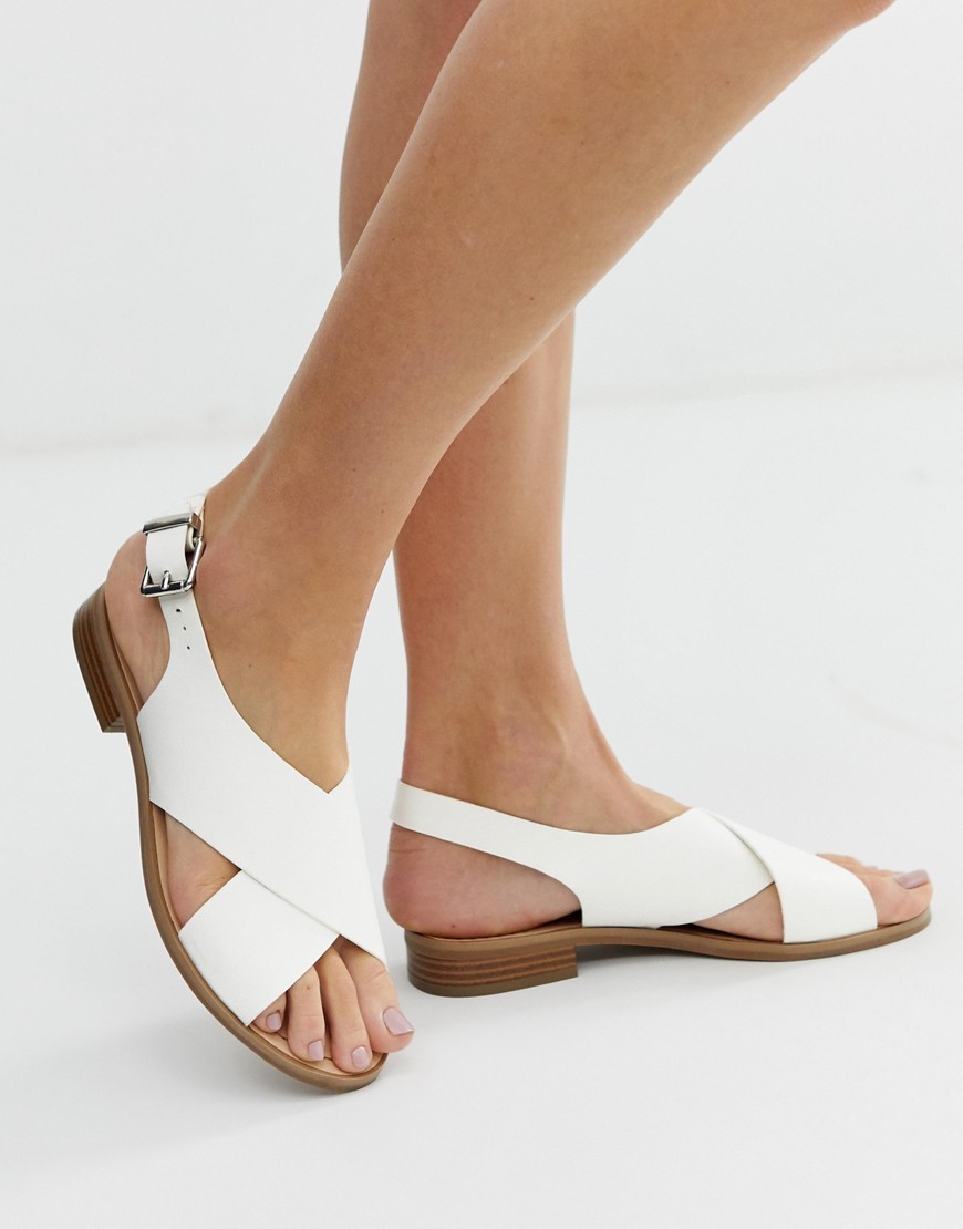 white cross sandals