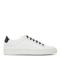 Woman by Common Projects White And Black Retro Low Glossy Sneakers