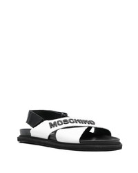 Moschino Logo Embossed Criss Cross Sandals