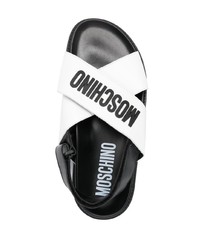 Moschino Logo Embossed Criss Cross Sandals