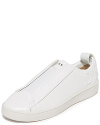 White Slip-on Sneakers by DKNY | Lookastic