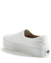 white leather platform slip on sneakers