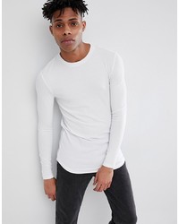 ASOS DESIGN Muscle Fit Longline Long Sleeve T Shirt With Curve Hem In Rib In White