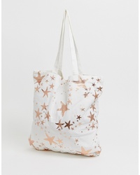 ASOS DESIGN Large Cotton Beach Tote Bag In Gold Starfish Print