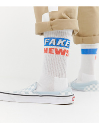 ASOS DESIGN Sports Style Socks With Fake News Slogan