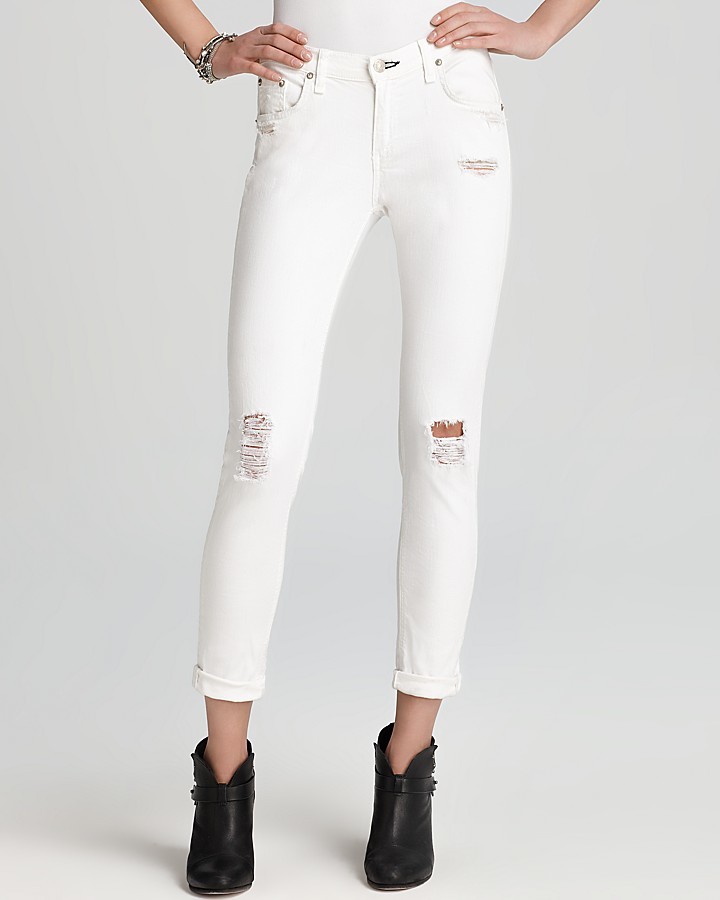 white tattered jeans