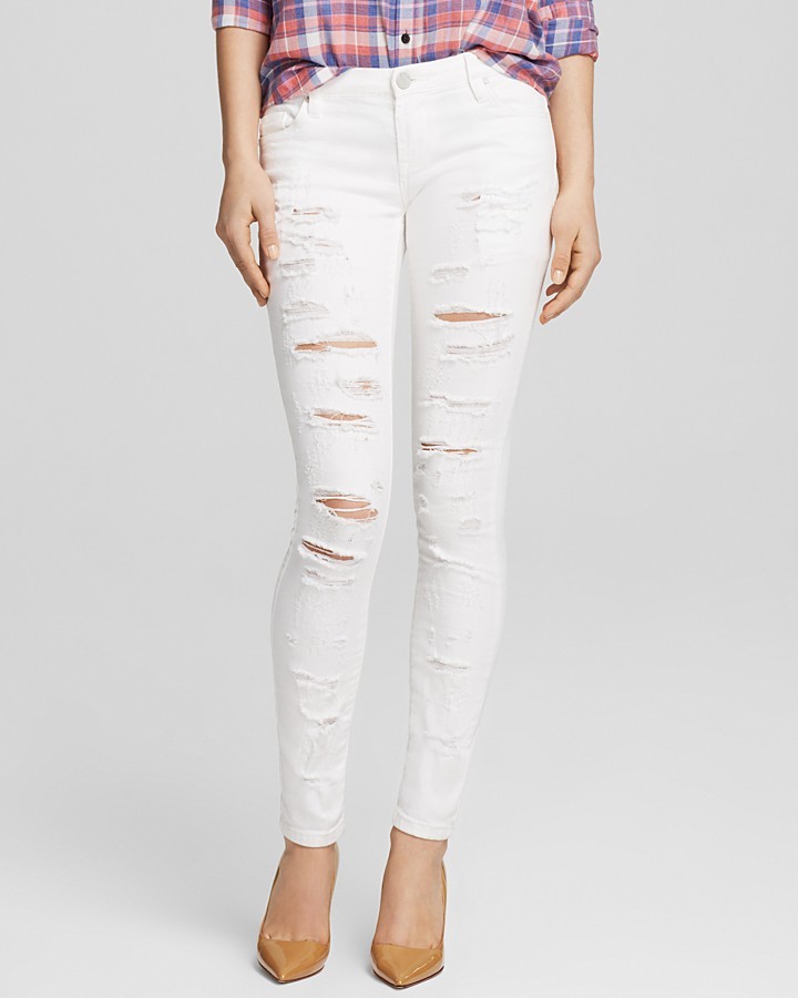 white shredded jeans