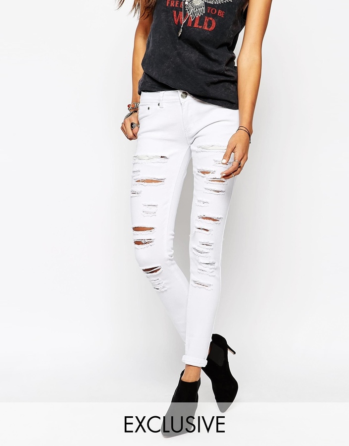 white shredded jeans