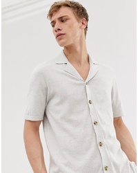 ASOS DESIGN Knitted Button Through Revere Polo In Off White