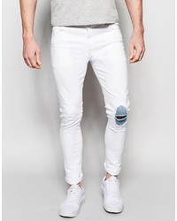 Asos Brand Super Skinny Jeans With Knee Rips And Patch Detail