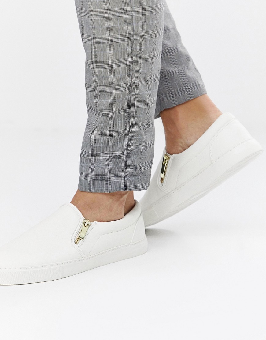 white slip on trainers