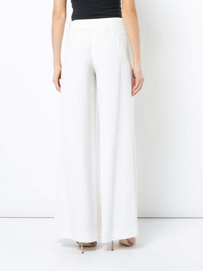 Carolina Herrera Pleated Flared Trousers, $1,290 | farfetch.com | Lookastic