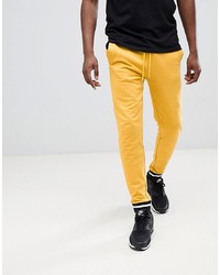 ASOS DESIGN Skinny Joggers In Yellow With Contrast Tipping